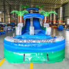 15ft Green Gush Commercial Single Lane Inflatable Water Slide front view highlighting blue slide, green inflatable pool, palm trees, and BounceWave branding in warehouse
