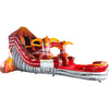 Large volcano-themed inflatable water slide featuring a single red sliding lane, tiki mask decorations, and an extended splash pool with lava-like design in indoor warehouse setting.