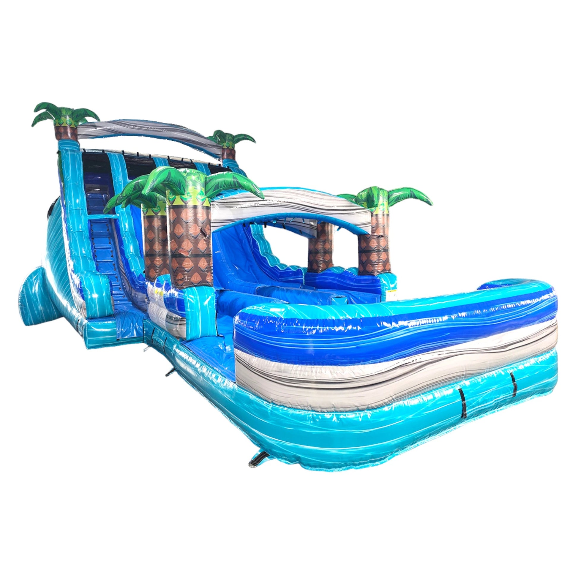 Side view of the 18-foot Bahama Blast inflatable water slide, showcasing its height, triple sliding lanes, vibrant blue and turquoise colors, and tropical design with palm trees. The extended splash pool and safety features are visible in this perspective.