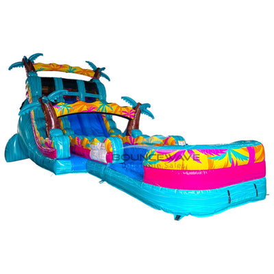 Close-up side view of Island Flow Palms hybrid water slide displaying vibrant colors, palm tree designs, dual sliding lanes, and large splash area on white background.