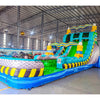 Side view of Radioactive Run hybrid water slide in indoor facility, showcasing its length, dual green lanes, industrial-themed decorations, and spacious splash pool.