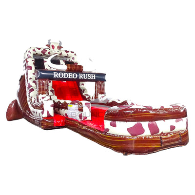 Side view of Rodeo Rush hybrid water slide showing full length with dual sliding lanes, cow print decorations, and large splash area with red sliding surface.