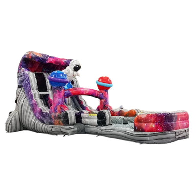 Large space-themed inflatable water slide featuring cosmic designs, an astronaut figure, dual sliding lanes with planet decorations, and an extended splash pool with colorful galaxy patterns.