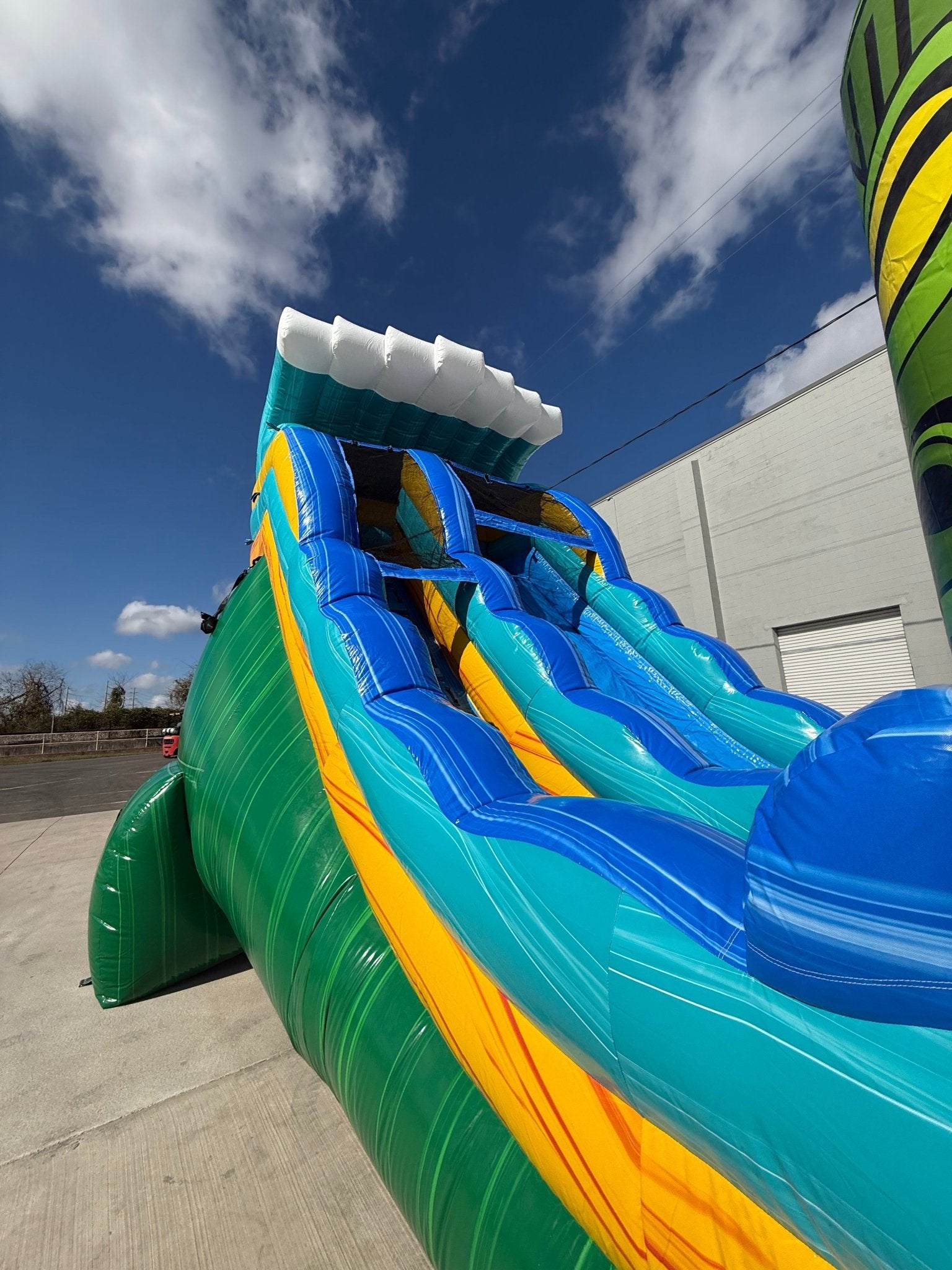 18ft Tiki Wave Commercial Single Lane Inflatable Water Slide - BounceWave Inflatable Sales