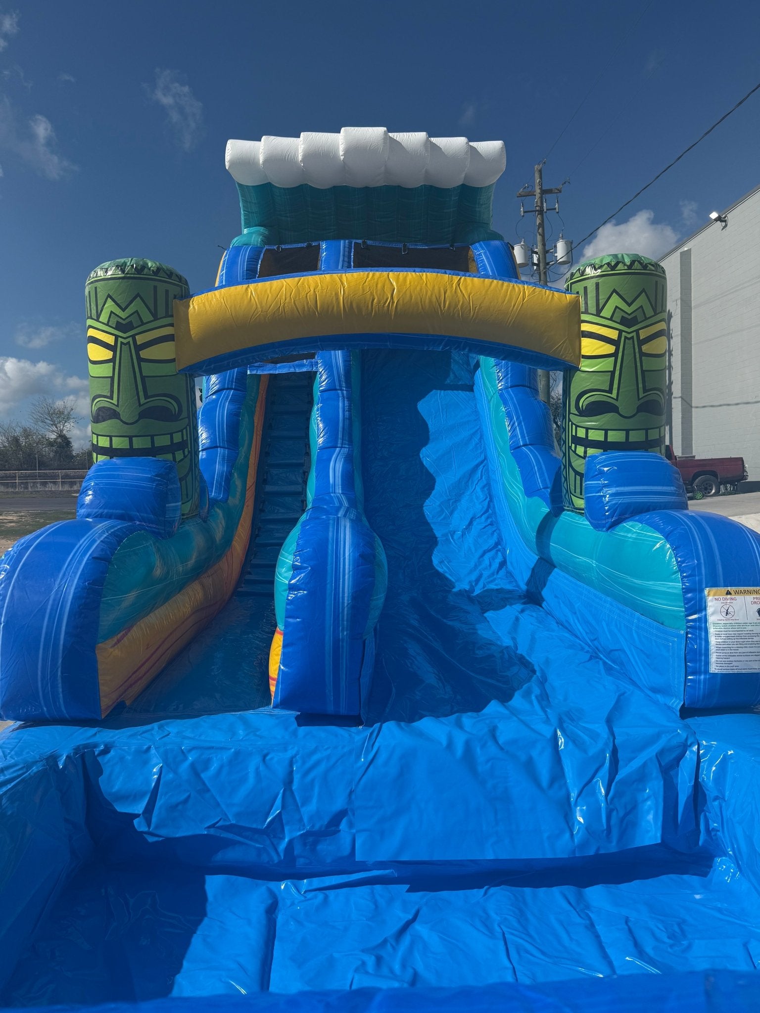 18ft Tiki Wave Commercial Single Lane Inflatable Water Slide - BounceWave Inflatable Sales