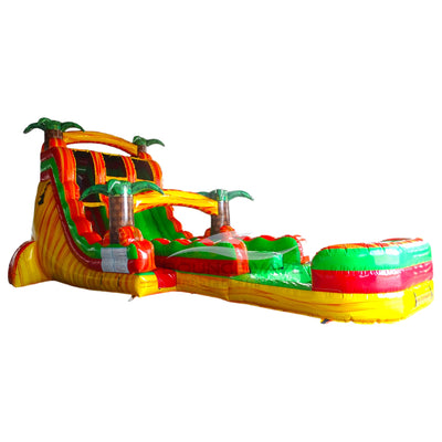 Side view of Tropical Inferno hybrid water slide showing full length with dual sliding lanes, palm trees, and large splash area with yellow, red, and green colors.