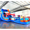 Angled view of 20ft Deep Sea Dive Hybrid DL water slide featuring blue color scheme, shark figures, octopus tentacles, and a large splash pool area. The slide is set up in an indoor warehouse with metal roofing and other equipment visible in the background.