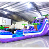 Side view of 20ft Purple Thunder Hybrid DL water slide showing bright purple and blue design, inflatable palm trees, and a large splash pool area. The slide features both open and enclosed sliding sections, displayed against a white background.