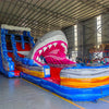 20ft Rip Curl Shark Attack 2pc Hybrid Dual Lane Inflatable Water Slide side view displaying shark head, blue water slide, and multicolored inflatable pool area
