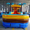 24ft Tropic Shock Dual Lane Commercial Water Slide with Inflatable Slip & Slide front view displaying colorful tropical theme, dual slides, and expansive inflatable pool area
