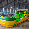 46ft Toxic Open Air Hybrid Inflatable Obstacle Course featuring yellow and black hazard stripes, multiple arches, and green base in large warehouse setting
