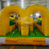 46ft Toxic Open Air Hybrid Inflatable Obstacle Course front view highlighting yellow and black caution-themed design, arched entrances, and green floor in indoor facility
