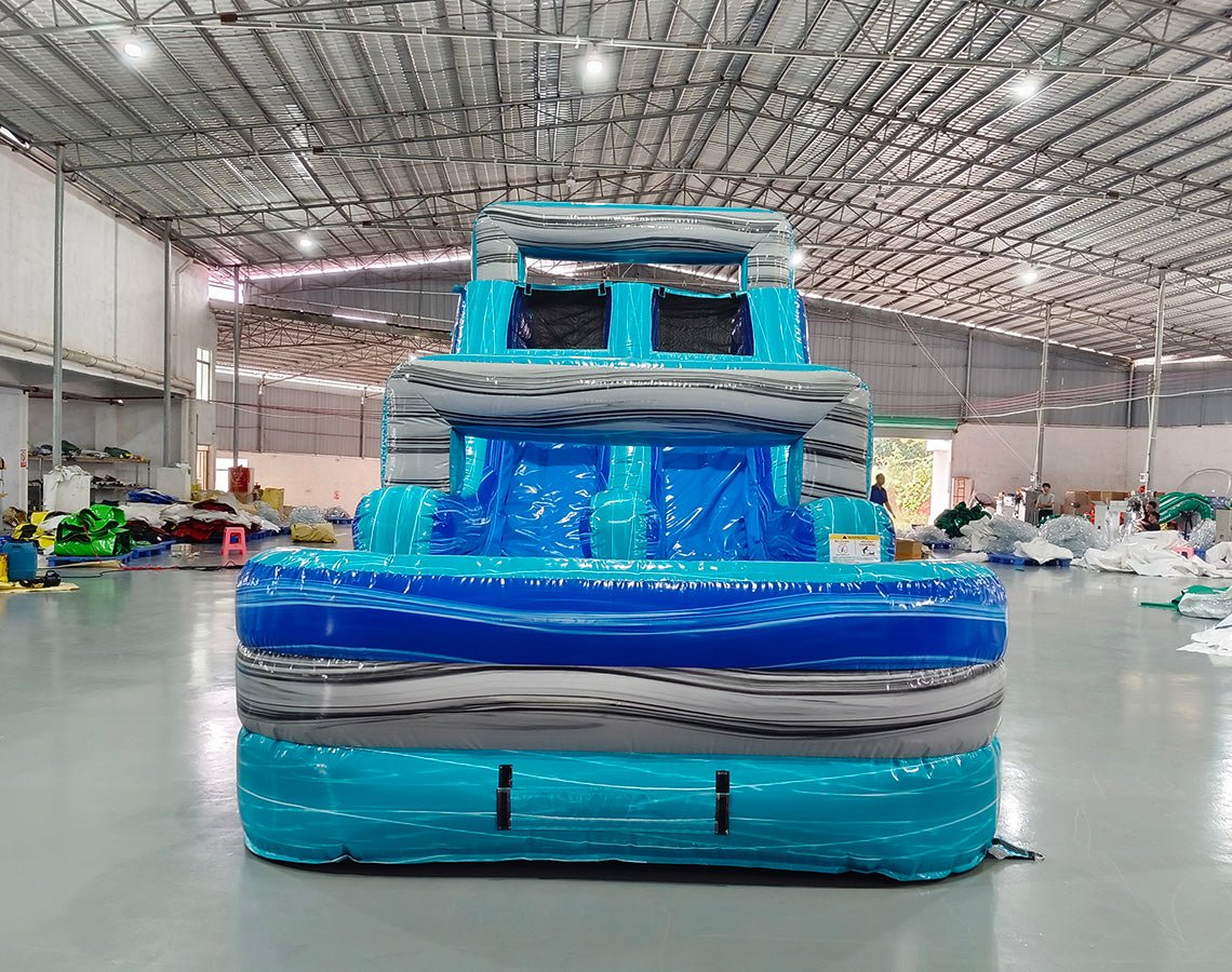 62ft Bahama 2-Piece Wet/Dry Inflatable Obstacle Course front view displaying vibrant blue and turquoise colors, wave-inspired patterns, and multiple entry points
