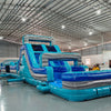 62ft Bahama 2-Piece Wet/Dry Inflatable Obstacle Course angled view highlighting blue and turquoise wave design, obstacle elements, and water slide ending in pool
