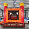 Front view of Buck Shot Econo Combo, showcasing the bounce house entrance with red pillars and yellow tops, orange walls, and a large deer head decoration. Set up in an indoor warehouse with other equipment and inflatables visible in the background.