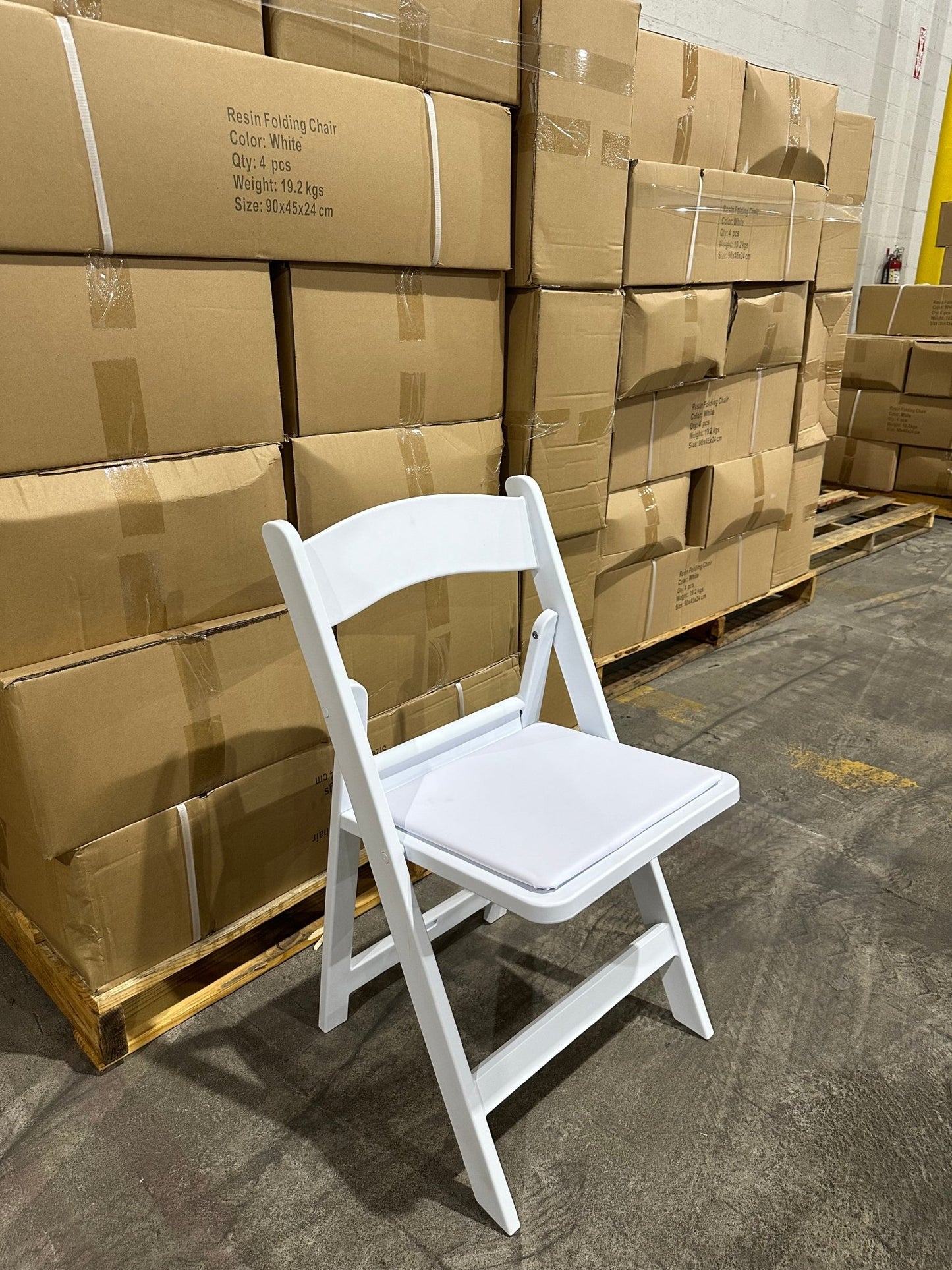 Commercial Grade White Resin Folding Chair - BounceWave Inflatable Sales