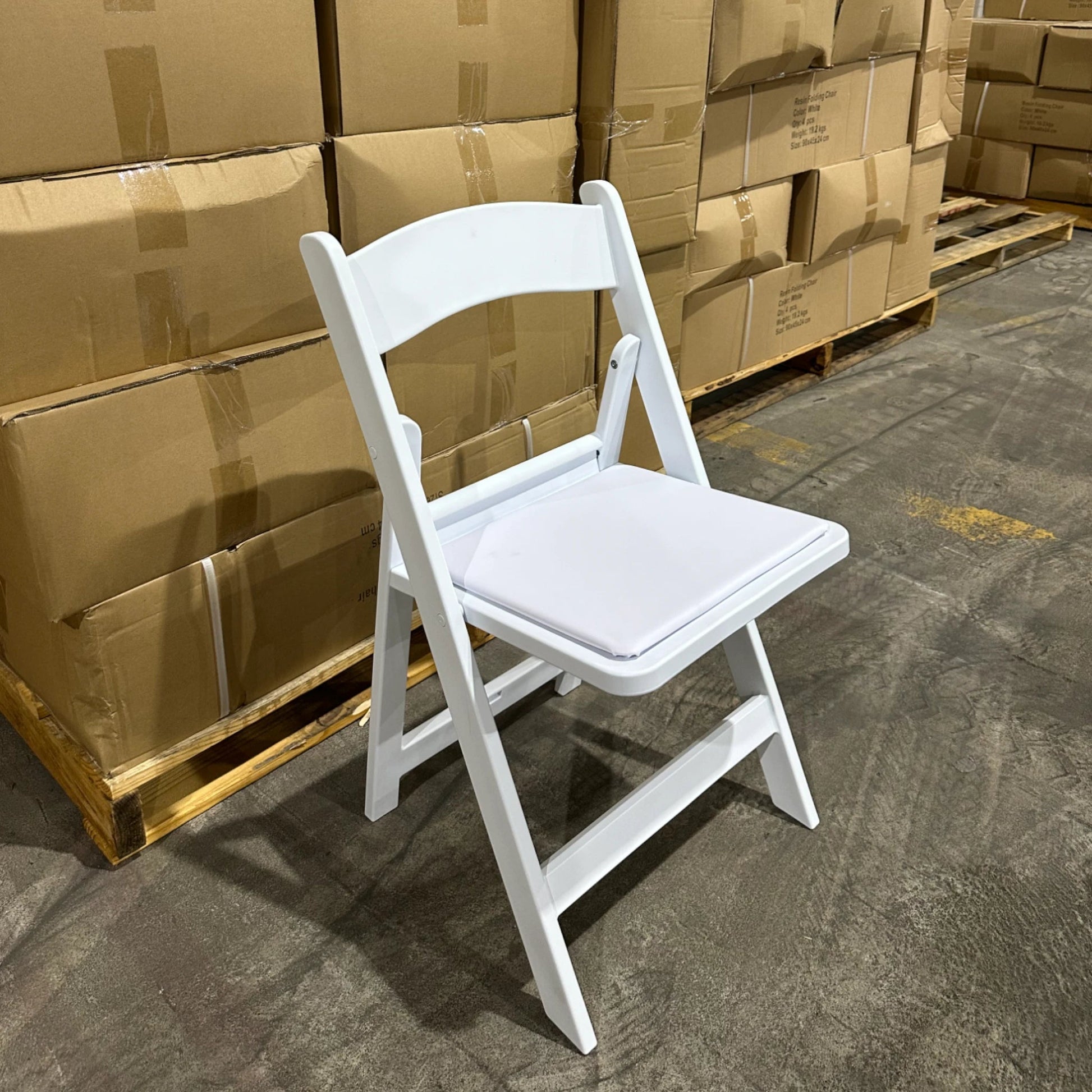 Commercial Grade White Resin Folding Chair - BounceWave Inflatable Sales