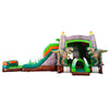 Large dinosaur-themed inflatable combo featuring a gray castle structure with green accents and flame-topped towers. Two realistic T-Rex figures flank the entrance. The combo includes dual slides, a bounce area, and inflatable foliage. Set against a white background, showcasing its prehistoric design for commercial wet/dry use.