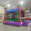 Euro Marble Commercial Grade Bounce House side angle displaying red towers with yellow tops, blue roof, and green walls in indoor facility
