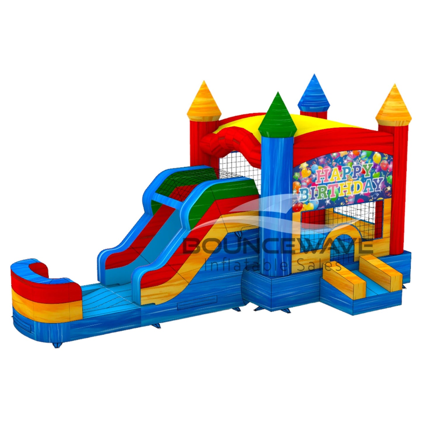 Front view of Seasonal Sampler Commercial Econo Inflatable Panel Combo with a "Happy Birthday" themed panel featuring colorful balloons and festive text. The inflatable structure has castle-like towers in red, blue, and yellow, dual slides, and a bounce house area with mesh windows. Set on a blue base with yellow entrance steps.
