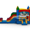 side view of Seasonal Sampler Commercial Econo Inflatable Panel Combo showcasing a Christmas-themed panel with Santa Claus, snowmen, penguins, and other festive characters against a snowy background. The inflatable structure features colorful towers, dual slides in red and green, and a bounce house area with mesh windows. Set on a blue base with yellow steps leading to the entrance.
