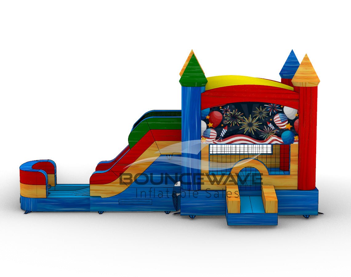 side view of Seasonal Sampler Commercial Econo Inflatable Panel Combo displaying a patriotic Fourth of July themed panel with fireworks, balloons, and American flags. The inflatable includes colorful castle-like towers, dual slides in red and green, and a bounce house area. The structure is set on a blue base with yellow entrance steps and features multiple spires in various colors.
