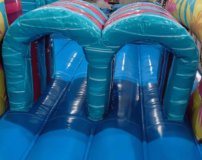 40 Island Flow Wrap Around 2 Piece Obstacle 4 compress » BounceWave Inflatable Sales